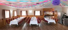 Newmarket Inn | East Gwillimbury, Ontario, L9N 0J2 | Meeting room tables with red chairs and blue and pink streamers hanging